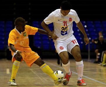 Tahiti's Antoine Tave tangles with Vanuatu's Albert Tho. OFC Futsal Championship Invitational 2013, Match Day One, Tahiti v Vanuatu, The Trusts Arena, Auckland, New Zealand, Tuesday 23rd July 2013. Photo: Shane Wenzlick